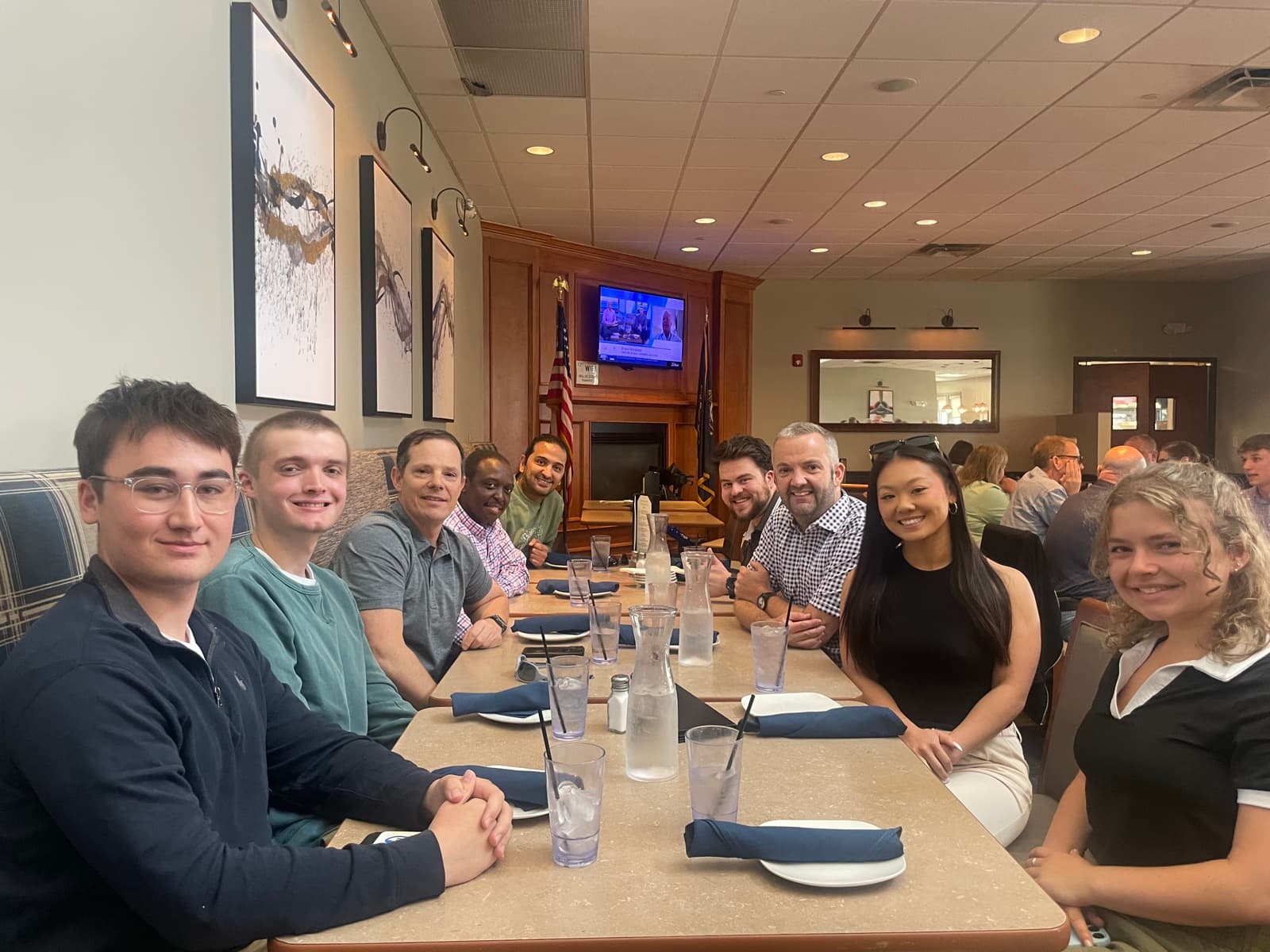 The team around a long lunch table